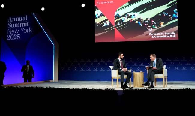 NEW YORK, NEW YORK - SEPTEMBER 22: H.E. Ahmed al-Sharaa, President of the Syrian Arab Republic, and General David H. Petraeus (US Army, Ret.) speak onstage during the 2025 Concordia Annual Summit at Sheraton New York Times Square on September 22, 2025 in New York City.  (Photo by Riccardo Savi/Getty Images for Concordia Annual Summit)